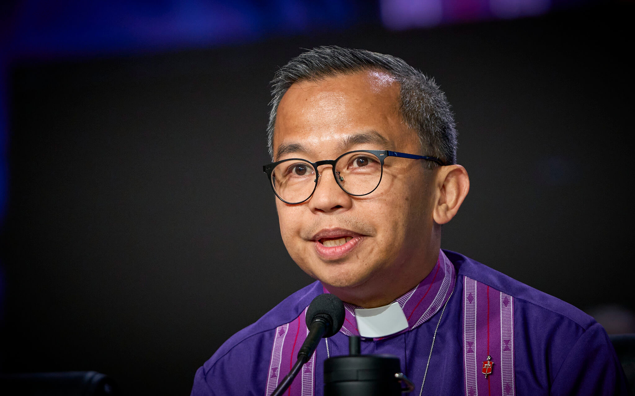 Bishop Carlo A. Rapanut presides on April 24, 2024, over a session of the 2024 United Methodist General Conference in Charlotte, N.C. Photo by Paul Jeffrey/UM News.