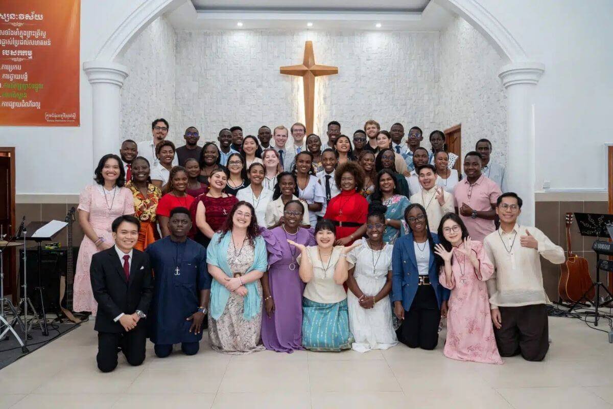 The 2026-28 class of Global Mission Fellows stand together after their commissioning into mission service on July 26, 2026, at Wesley Methodist Church in Phnom Penh, Cambodia. Photo: S25 media