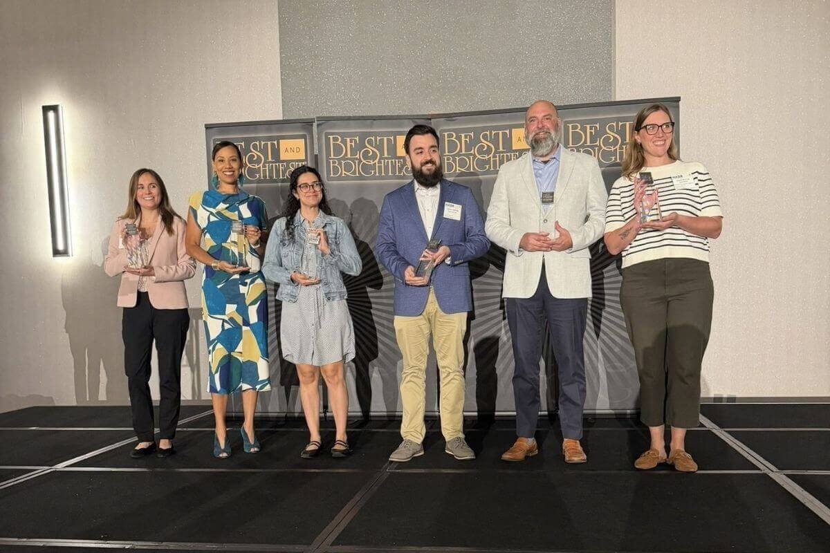 Nicole Durham (second from left) accepts the award on behalf of Wespath on September 15, 2026. Photo courtesy of Wespath.
